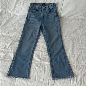 BDG Kick Flare High-Rise Jeans in Medium Blue with Frayed Raw Hem